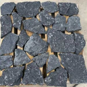 A vibrant display of free form natural loose stone wall cladding in earthy tones.